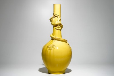 A tall Japanese Awaji monochrome yellow vase with applied dragon, Meiji, ca. 1900