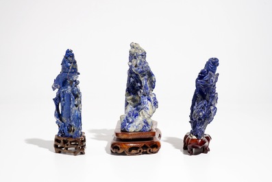 Three Chinese lapis lazuli sculptures on wooden stands, 20th C.