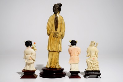 Four Chinese ivory figures on wooden bases, 19/20th C.