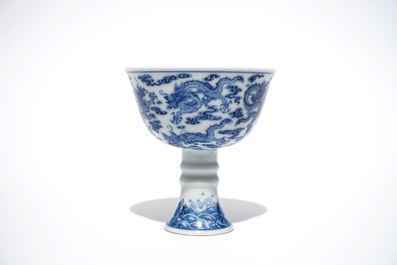 A Chinese blue and white nine-dragon stem cup, Yongzheng mark and poss. of the period