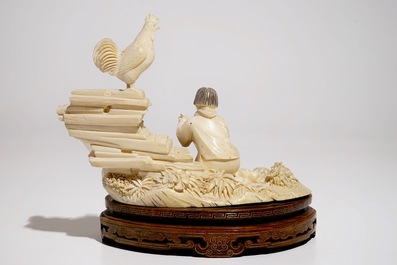 A Chinese ivory group with a girl on a wooden stand, 2nd quarter 20th C.