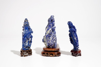 Three Chinese lapis lazuli sculptures on wooden stands, 20th C.