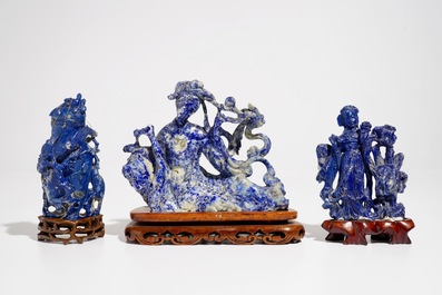 Three Chinese lapis lazuli sculptures on wooden stands, 20th C.