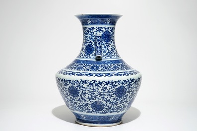 A Chinese blue and white lotus scroll hu vase, Qianlong mark, 19th C.