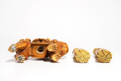 A Chinese ivory model of Guanyin on a Buddhist lion and two sages, 19th C.