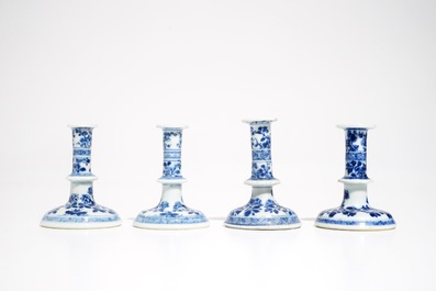 Four small Chinese blue and white floral candlesticks, Kangxi