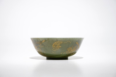 A Chinese spinach green jade engraved and gilt bowl, 19/20th C.