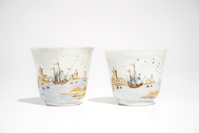 A pair of Chinese Meissen style cups and saucers with a harbour scene, Qianlong