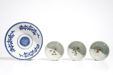 Three Chinese famille verte crackle glaze cups and saucers and a blue and white soft paste bowl, Kangxi