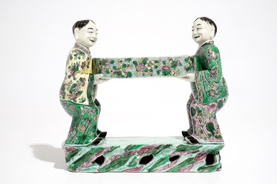 A Chinese verte biscuit group of the Hehe Er Xian brothers holding a tray, 19th C.