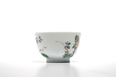 A Chinese famille verte cup and saucer with yin-yang mark, Kangxi