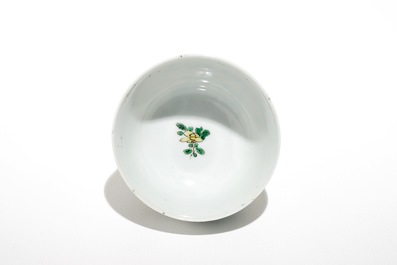 A Chinese famille verte cup and saucer with yin-yang mark, Kangxi