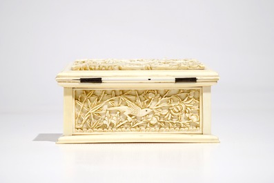 A rectangular Chinese carved ivory casket, Canton, 19th C.