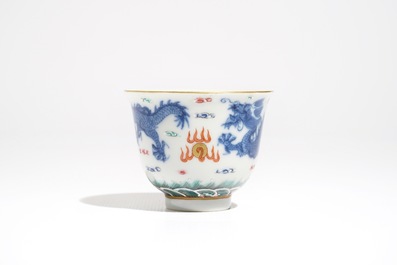 A Chinese famille rose cup and stand with dragon design, Qianlong mark, 19/20th C.