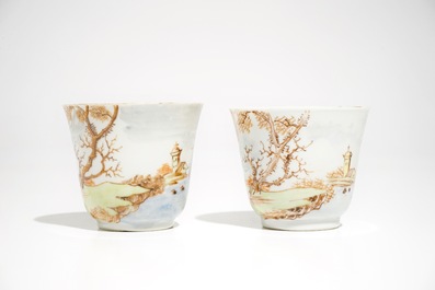 A pair of Chinese Meissen style cups and saucers with a harbour scene, Qianlong