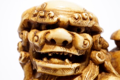 A Japanese laquer inro with ivory netsuke and agate ojime, and a Buddhist lion netsuke, Meiji/Taisho