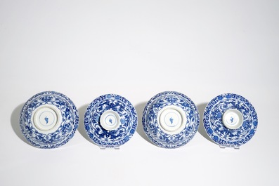 A pair of Chinese blue and white covered bowls with stylised dragon design, 19th C.