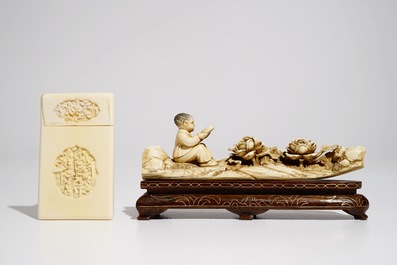 A Chinese ivory model of a reading boy and a Canton card holder, 19/20th C.