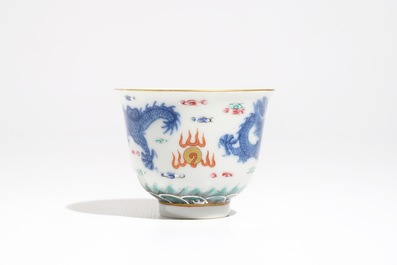 A Chinese famille rose cup and stand with dragon design, Qianlong mark, 19/20th C.