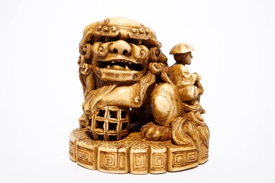 A Japanese laquer inro with ivory netsuke and agate ojime, and a Buddhist lion netsuke, Meiji/Taisho