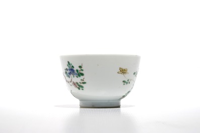 A Chinese famille verte cup and saucer with yin-yang mark, Kangxi