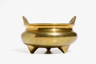 A Chinese bronze tripod censer, Xuande mark, 19th C.