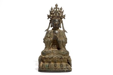 A Chinese inscribed and dated gilt bronze figure of Guanyin, Ming