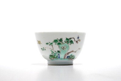 A Chinese famille verte cup and saucer with yin-yang mark, Kangxi