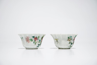 A pair of Chinese lobed famille rose cups and saucers, Yongzheng