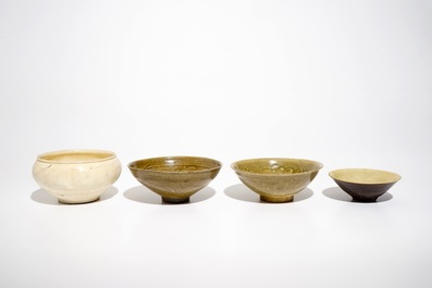 Four Chinese monochrome celadon- and cream-glazed bowls, Song and later