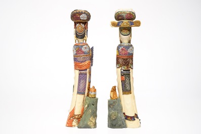 A pair of Chinese polychrome ivory figures, early 20th C.