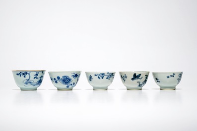 Fifteen sets of Chinese blue and white cups and saucers, Kangxi/Qianlong