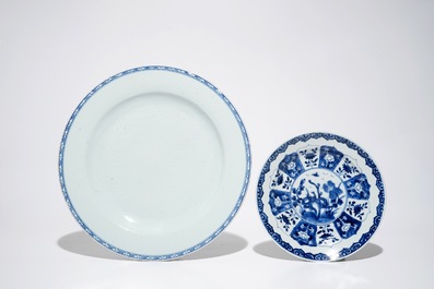 A Chinese Yixing stoneware teapot, two blue and white plates and a silver-mounted kendi, Kangxi/Qianlong