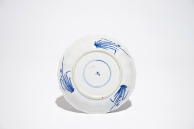 Five Chinese blue and white cups and saucers, Kangxi