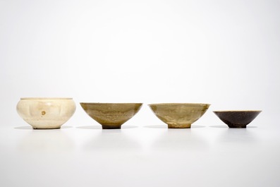 Four Chinese monochrome celadon- and cream-glazed bowls, Song and later