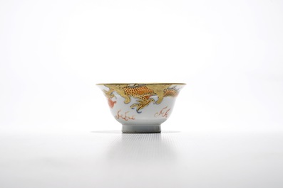 Seven Chinese iron red and gilt cups and saucers with dragons, Yongzheng/Qianlong