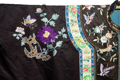 A Chinese embroidered silk woman's robe with butterflies and fruits, Qing