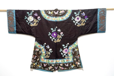 A Chinese embroidered silk woman's robe with butterflies and fruits, Qing