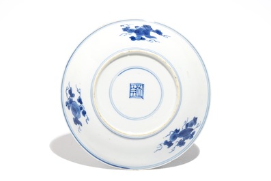 Eight Chinese blue and white cups and eleven saucers with fish, Kangxi