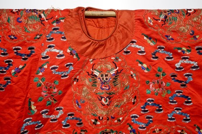 A Chinese embroidered red silk robe, Qing