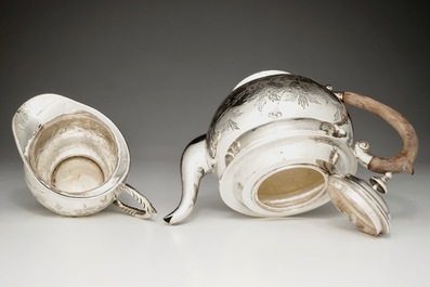 A Chinese silver teapot and milk jug, 19/20th C.