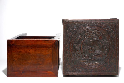 Two Chinese carved wood stands and a low table, 19th C.