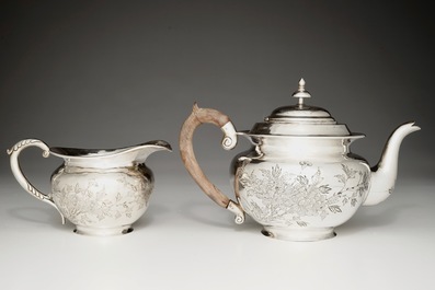 A Chinese silver teapot and milk jug, 19/20th C.