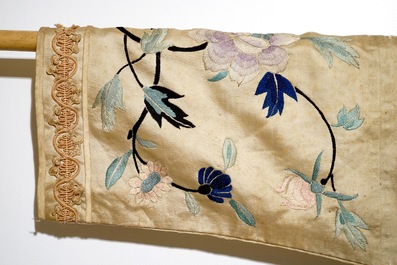 A Chinese embroidered silk woman&rsquo;s robe, late Qing or early Republic