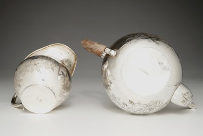 A Chinese silver teapot and milk jug, 19/20th C.