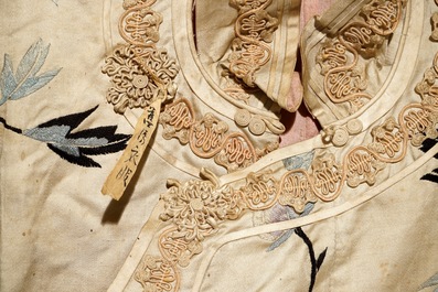 A Chinese embroidered silk woman&rsquo;s robe, late Qing or early Republic