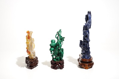 Three Chinese lapis lazuli, agate and malachite figures on stands, 20th C.