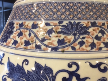 A Chinese copper-red and underglaze blue peony scroll hu vase, Qianlong mark, 19th C.