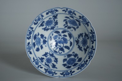 A Chinese blue and white bowl with flowers and fruits, 19th C.