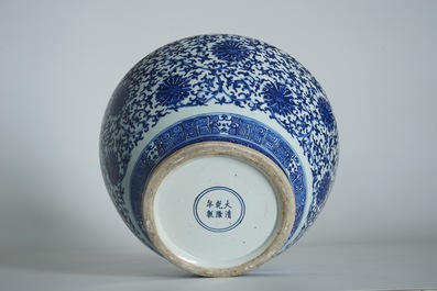 A Chinese blue and white lotus scroll hu vase, Qianlong mark, 19th C.